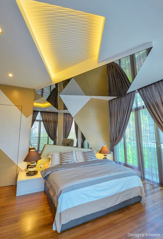 Angles and mirrored bedroom for semi-d in Anjung Tiara, Segambut by Desigva Interior. Source