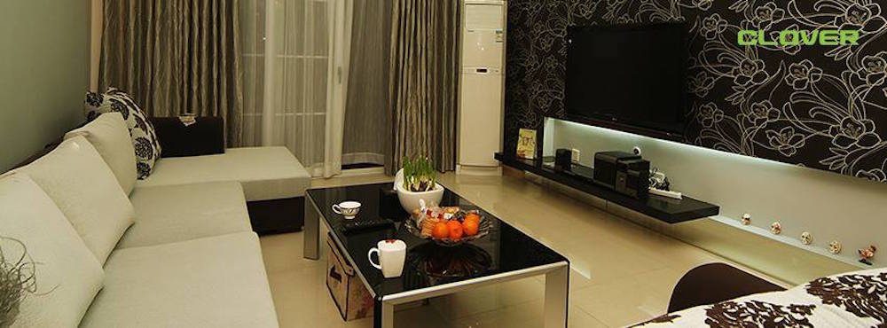 Cosy living room byย Clover Buildcon Sdn. Bhd.