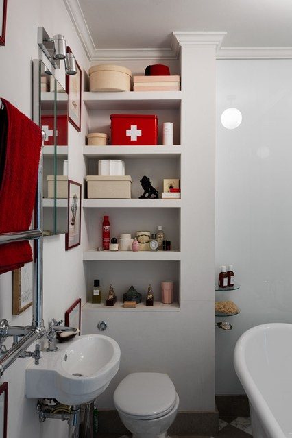 Seamless shelving built around the WC