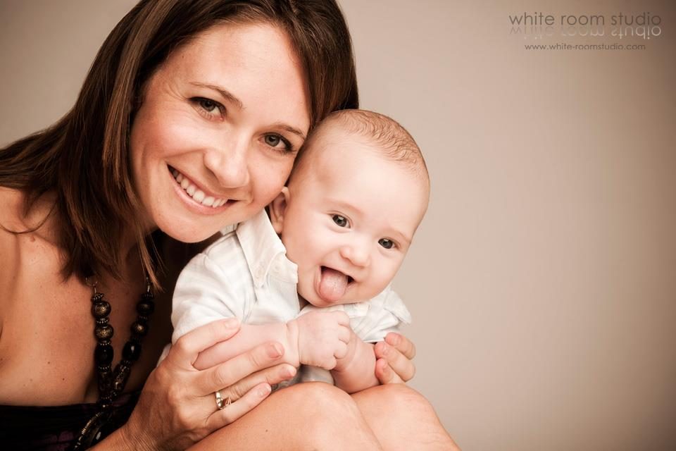 Sharing a moment with Mummy. White Room Studio. Source