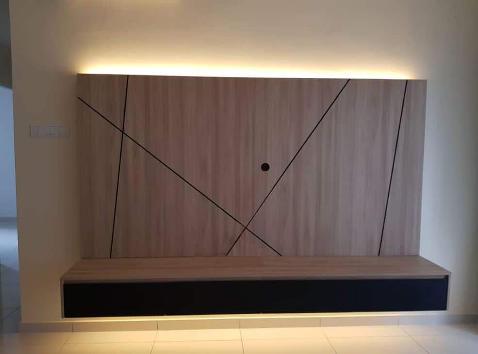 Work in progress photo showing built-in tv cabinet design with hidden lighting