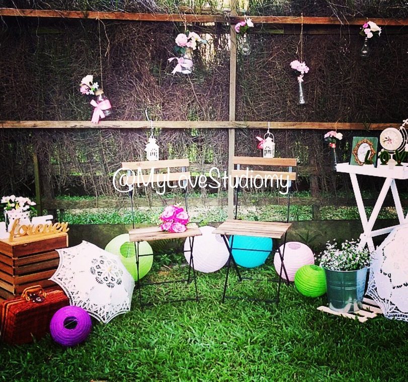 Wooden fence and woven branches make a beautiful outdoor backdrop