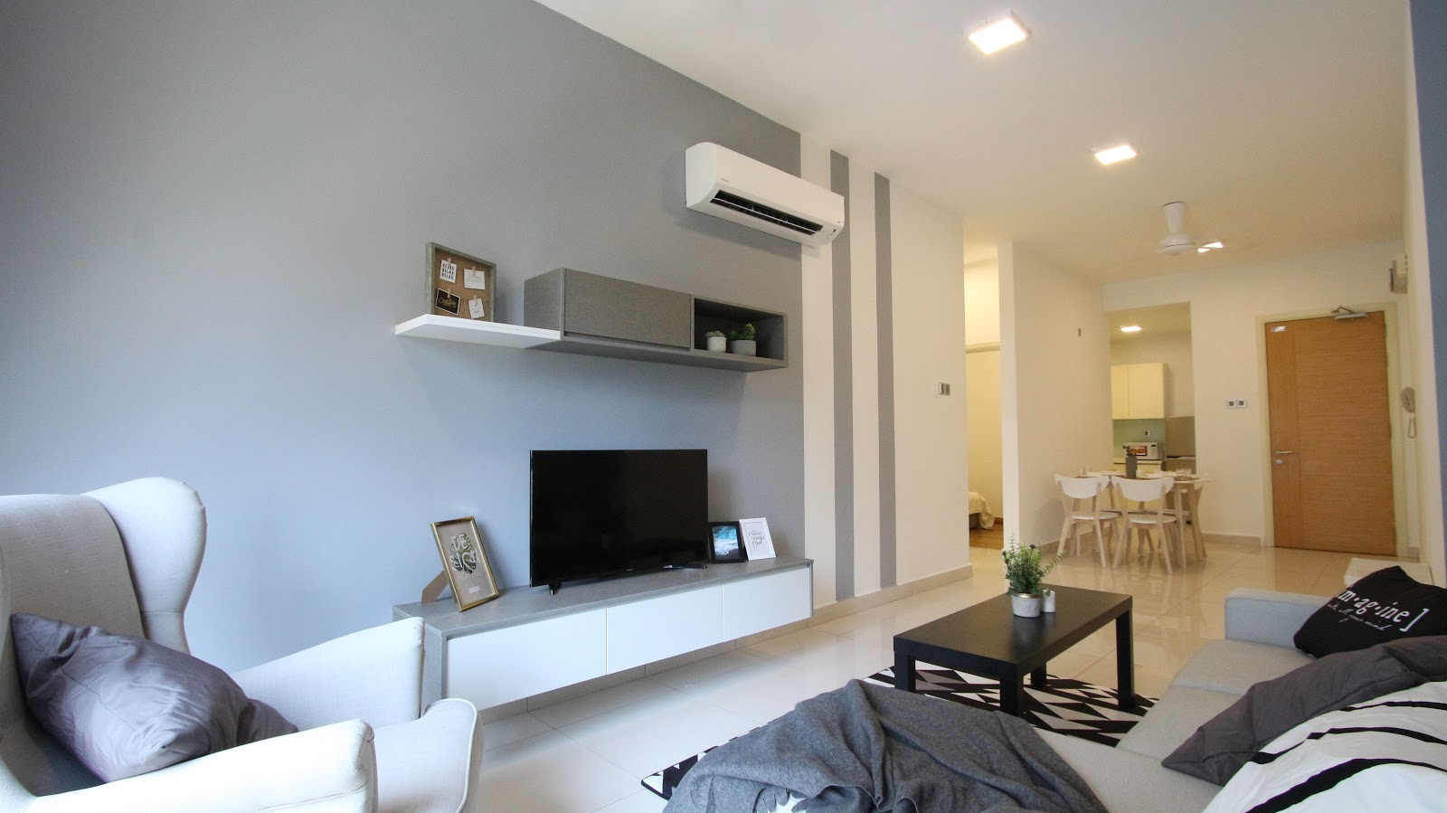 Built-in TV cabinet design at completed project site for short-stay unit. By Recommend.my