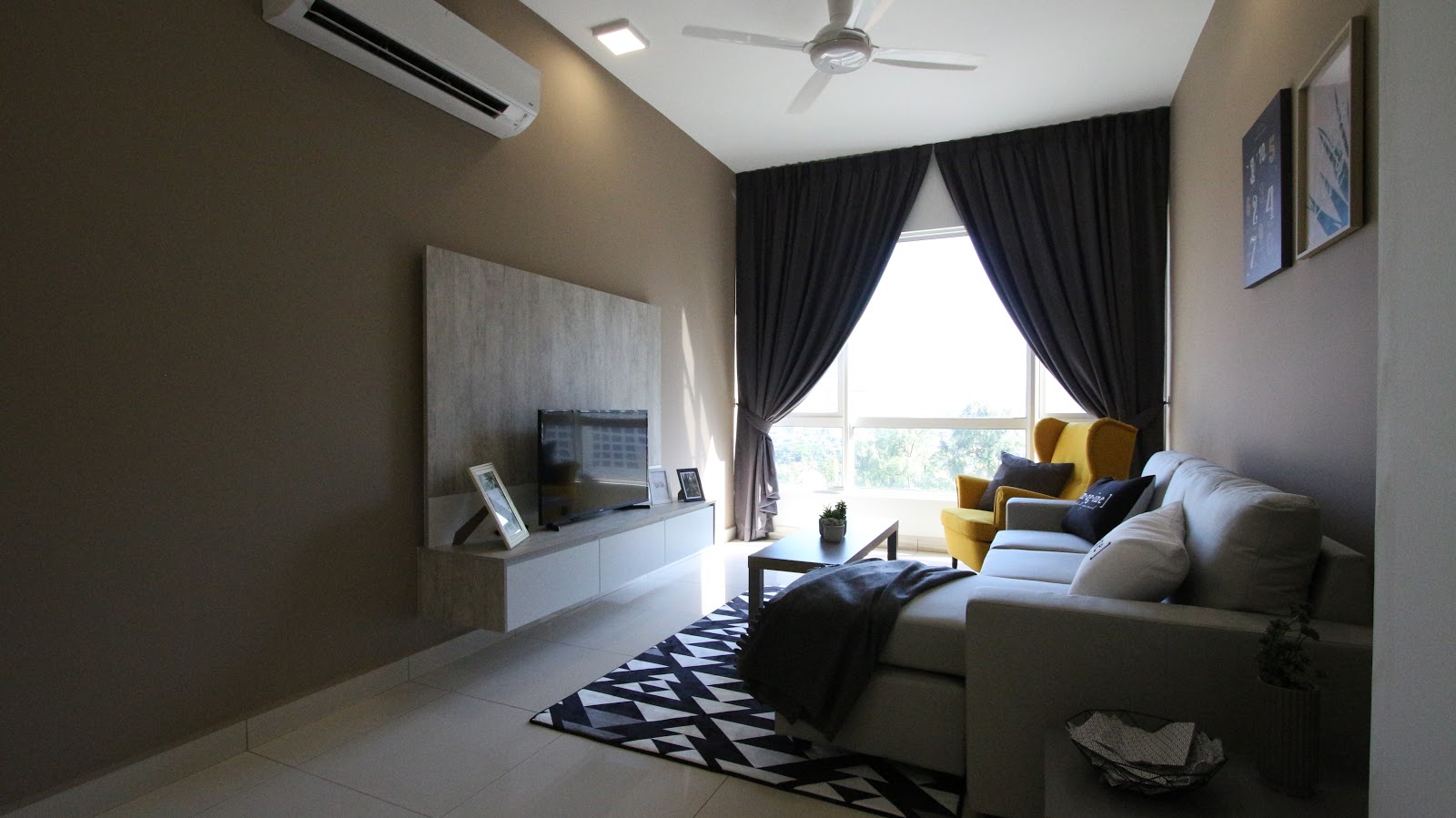 Built-in TV cabinet design at short-stay unit. Project by Recommend.my