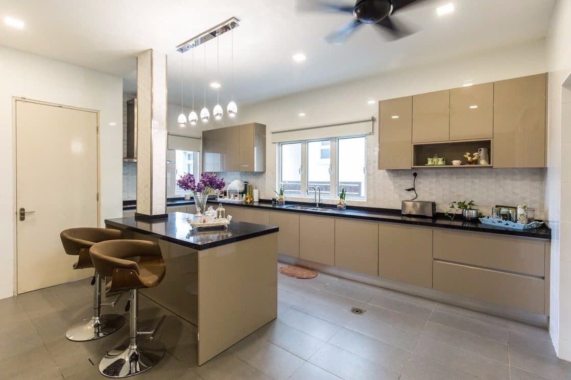 Above: Wet kitchen with island in house in XXX by Klaas Interiors