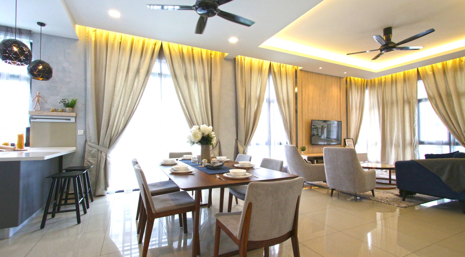 Above: Open floor plan to combine the living, dining and kitchen areas into a multi-functional space.