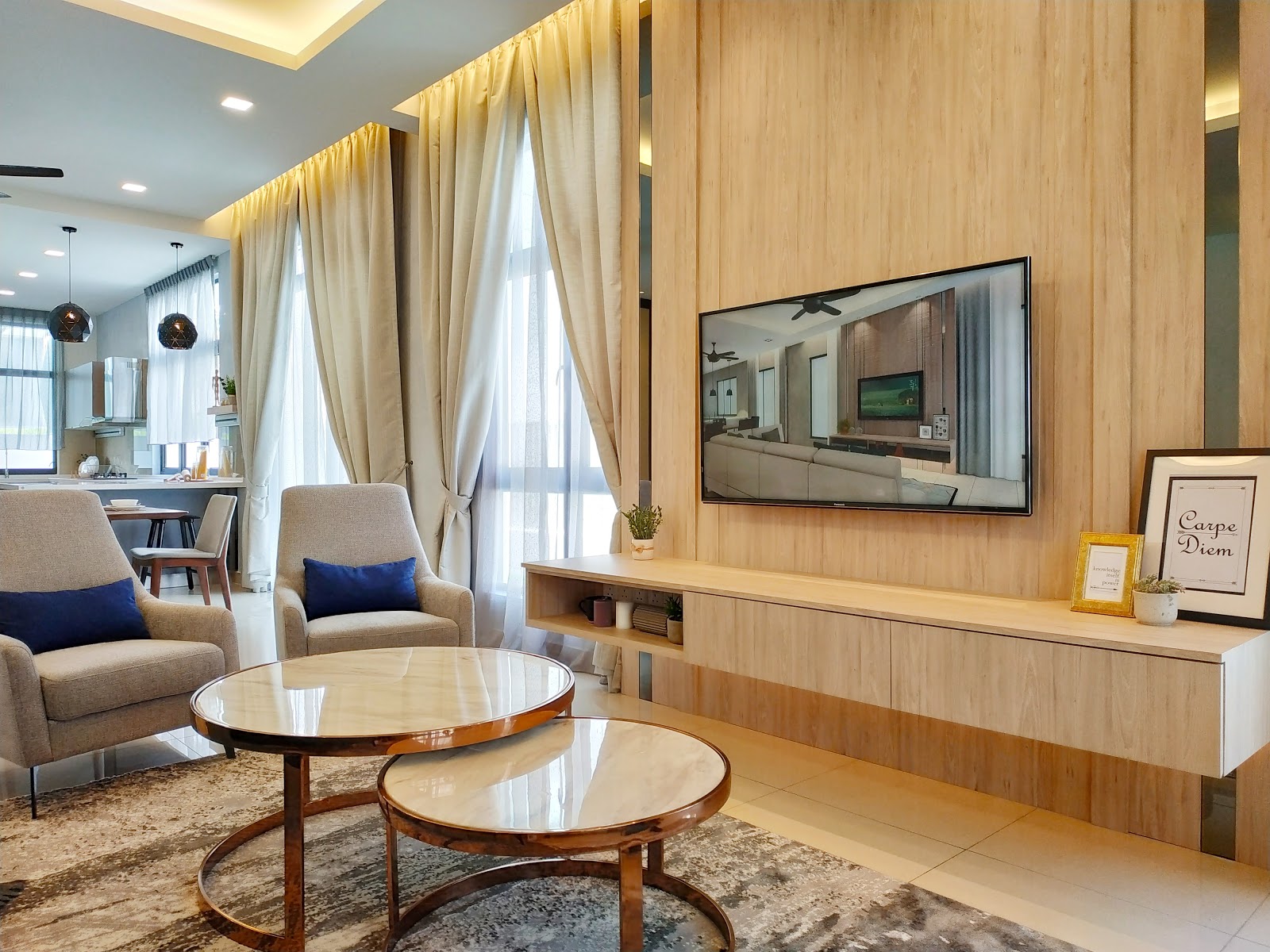 Above: Living area complete with a laminate TV console and curtains.