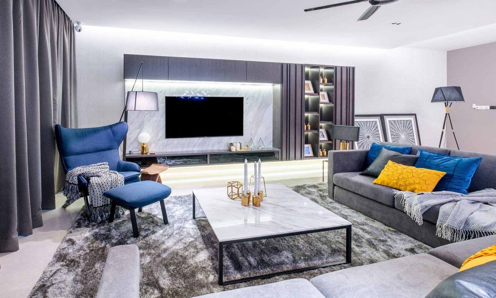 Above: New look of the living room. The Volakas white marble installed on both the TV cabinet backdrop and table gets all the attention here, infusing the space with a luxurious vibe.