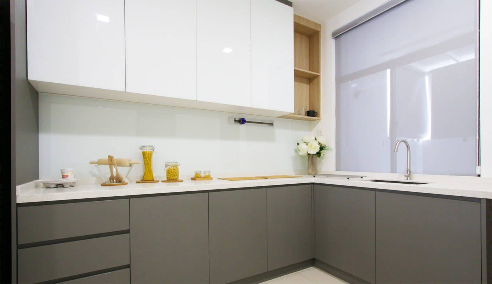 Sleek kitchen cabinets renovation in Southville City.