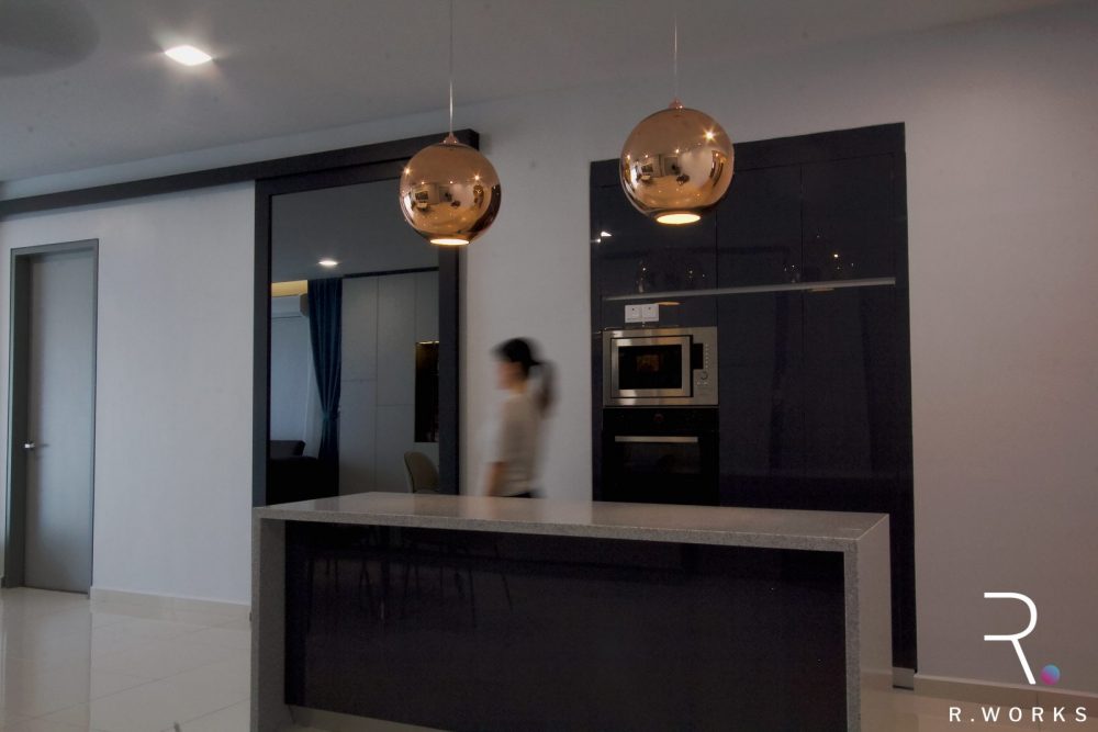 Fully designed dry kitchen area and grey mirror sliding panel