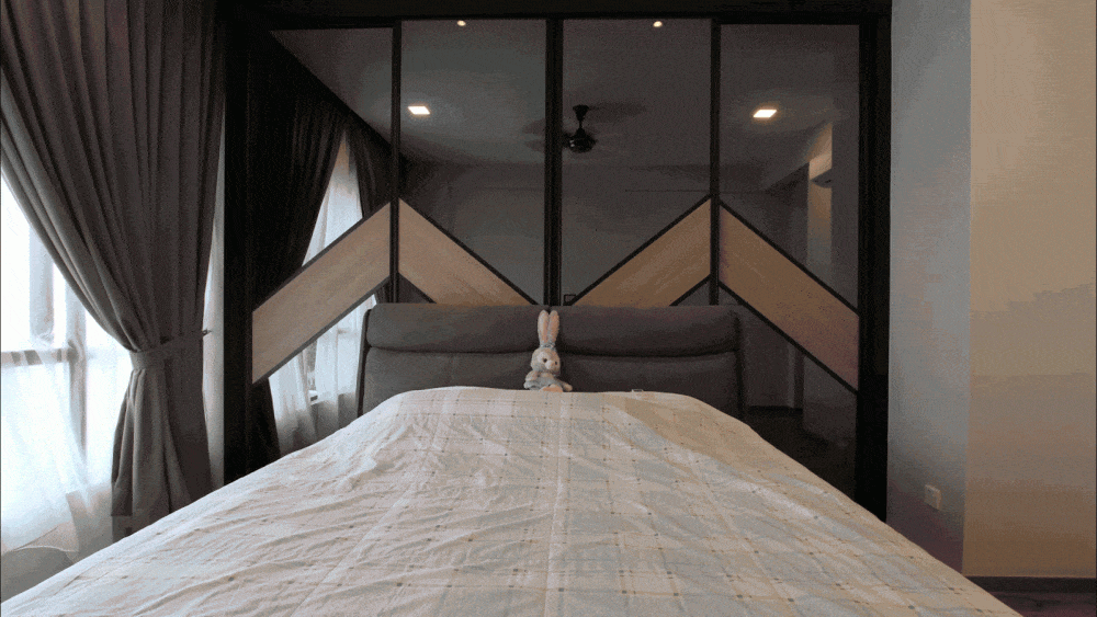 GIF of sliding panels of master bedroom feature wall