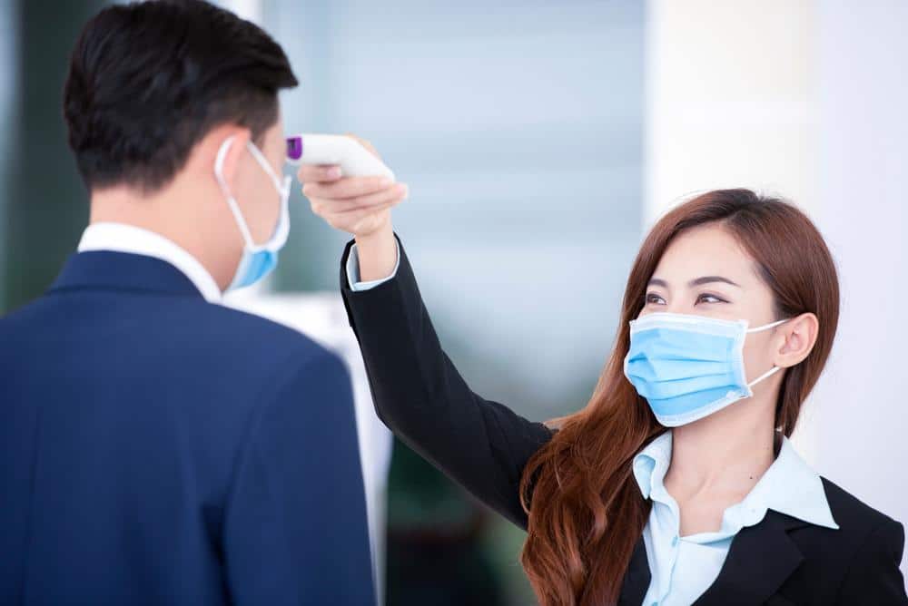 Temperature screening in an office lobby