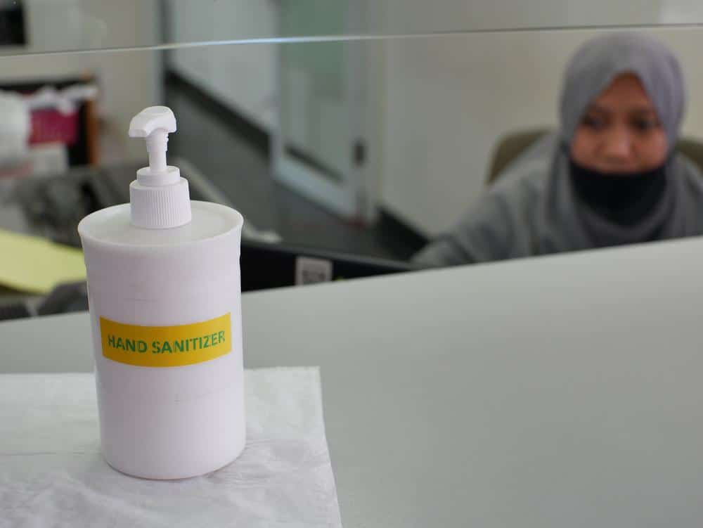 Hand sanitizers on front desks and counters