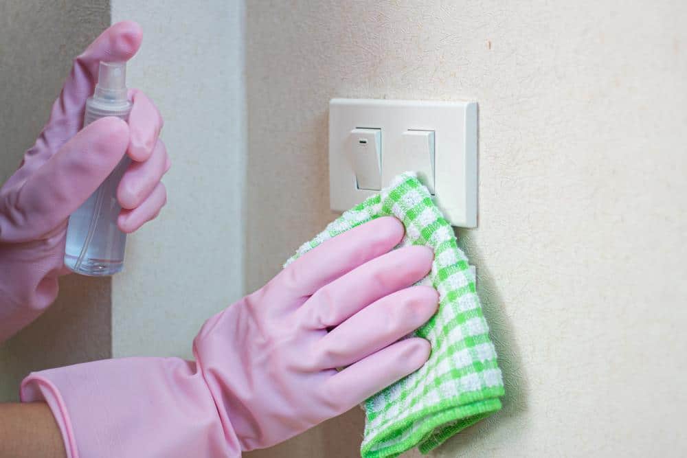 Disinfecting light switches at home