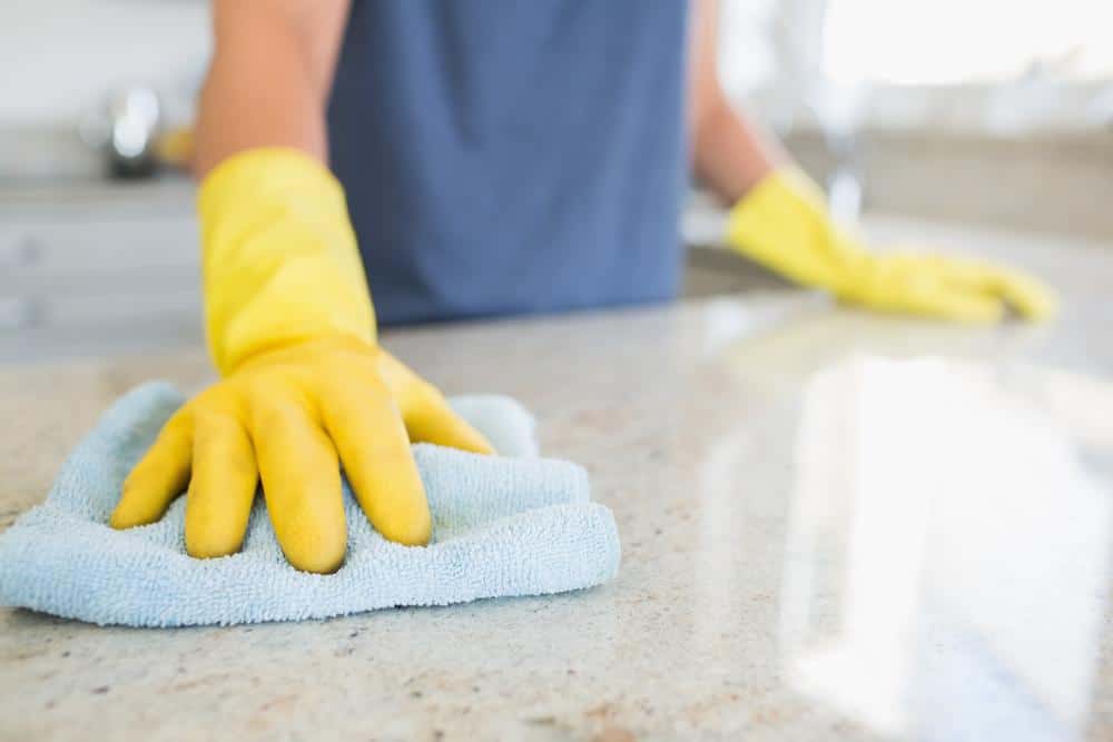 Wiping surface with disinfectant in an 'S' shaped pattern