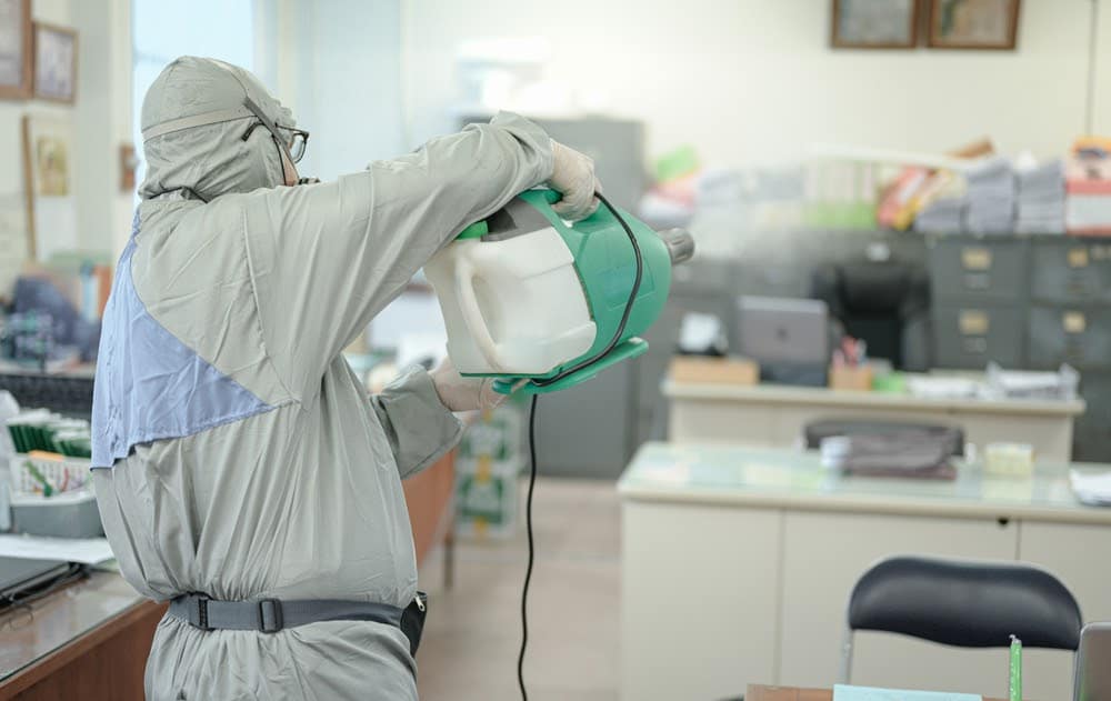 Professional disinfecting in progress for a corporate building