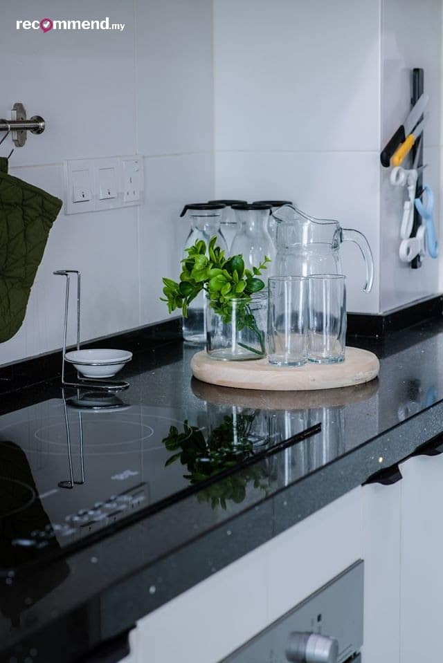 A detailed view of the kitchen counter top and induction stovetop