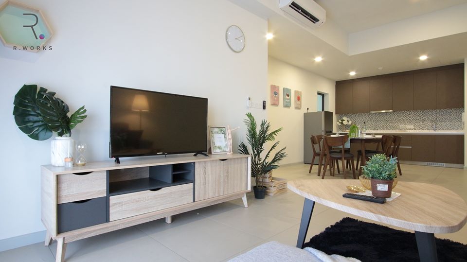 Light wood TV console in the modern chic living room at Seventeen Residence