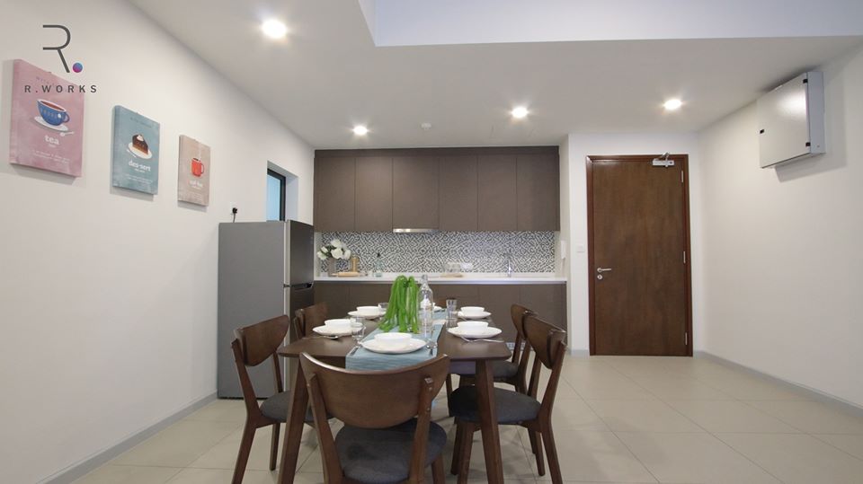 Dark brown furniture and built-ins in the kitchen at Seventeen Residence