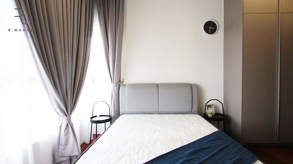 Bedroom in Seventeen Residences unit with taupe accents