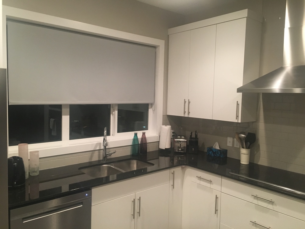 Roller blinds in the kitchen area