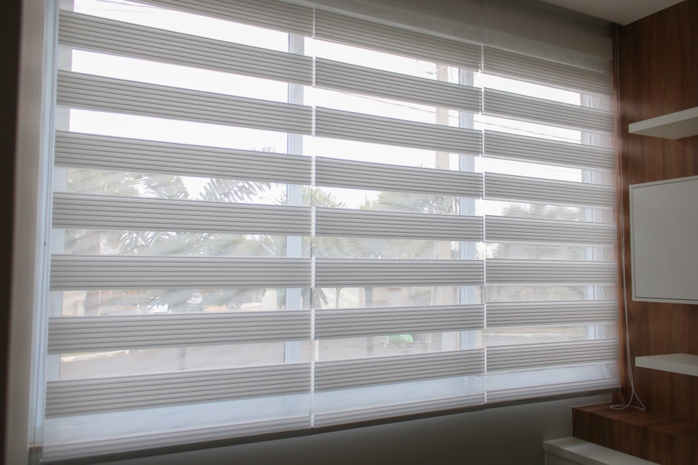 Open zebra blinds in the living room