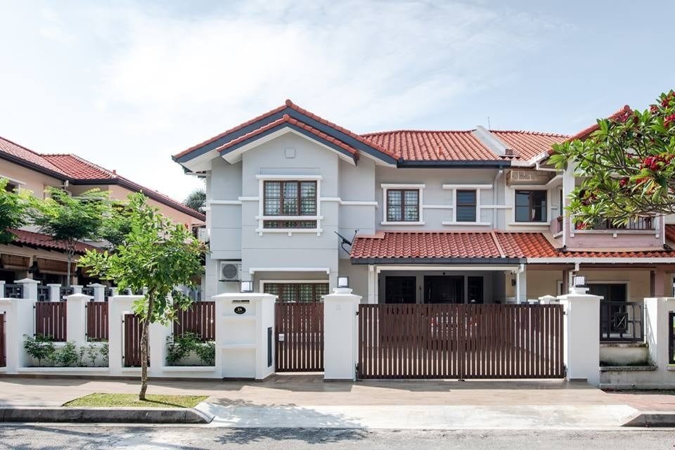 Home exterior design and renovation in Ara Damansara with dark wooden gates and light grey walls. By Pocket Square