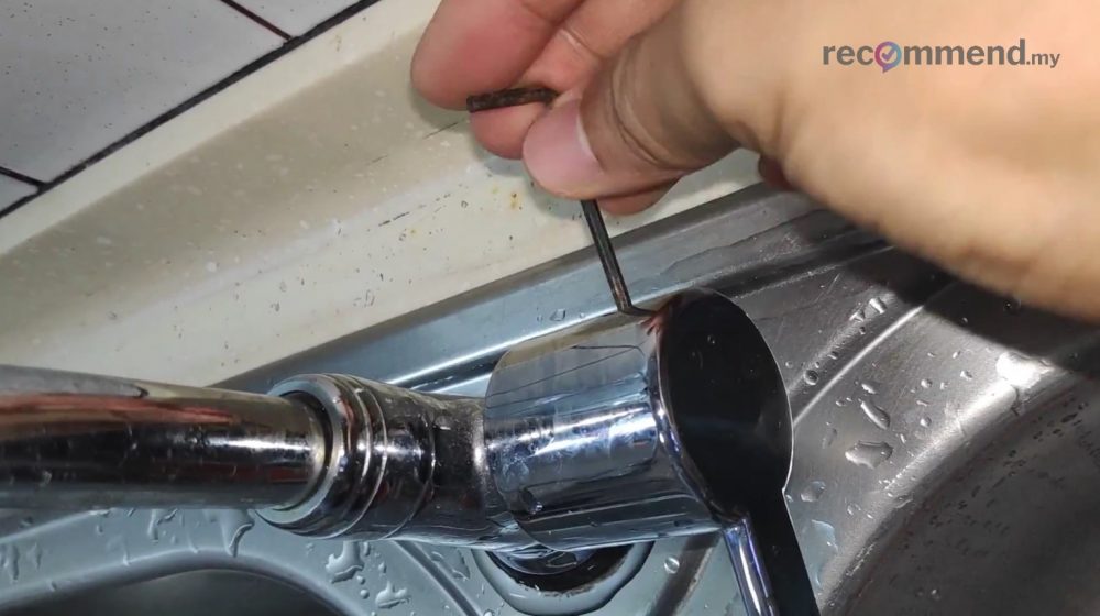 Loosen the grub screw with a hex or Allen key
