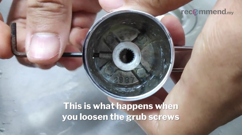 Loosen the grub screw with a hex or Allen key