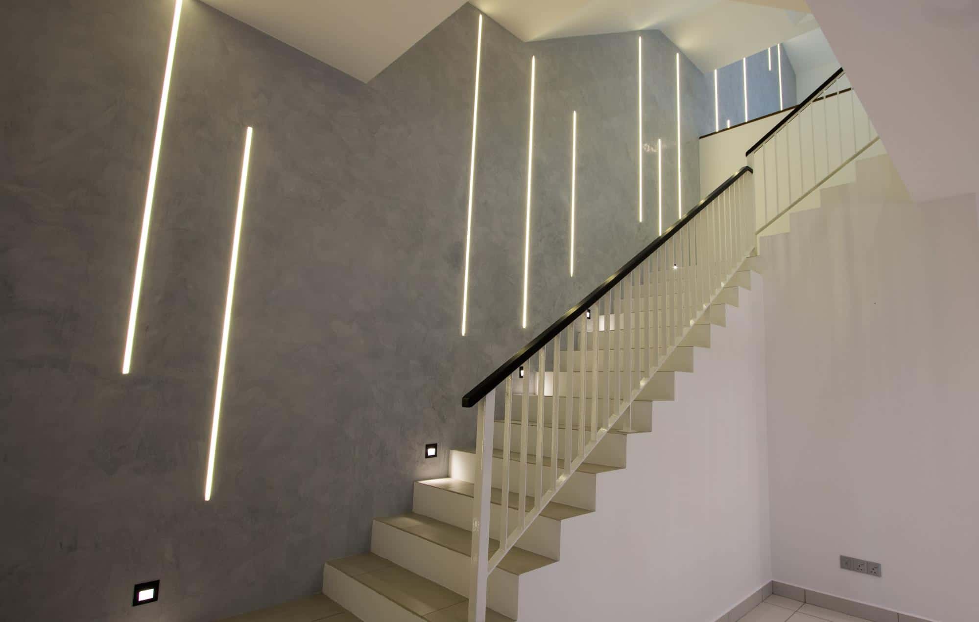 Modern industrial stairway feature wall with LED strip lights 