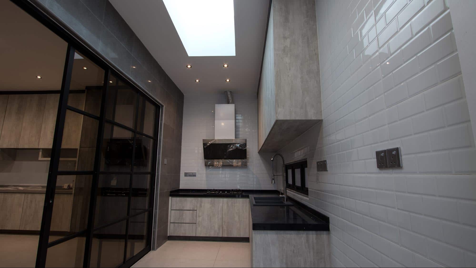 Modern industrial wet kitchen with soft white lighting
