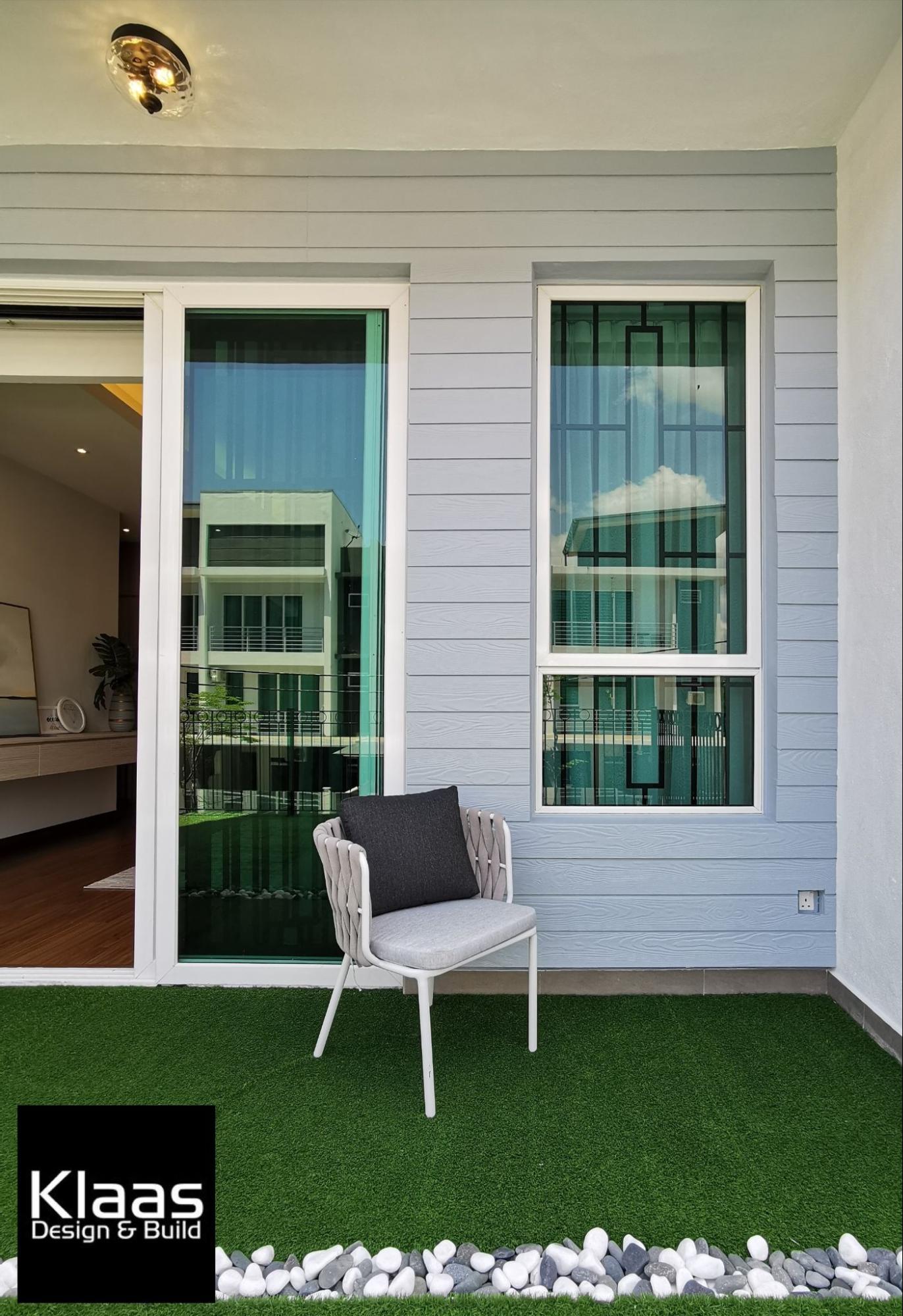 Lawn chair on a balcony garden 