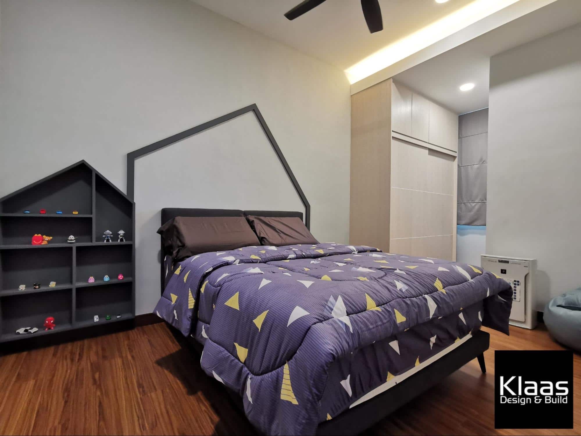 Boy's bedroom with custom made geometrical display shelf 