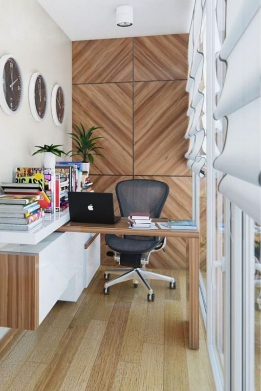 Rotating work desk with laminate feature wall