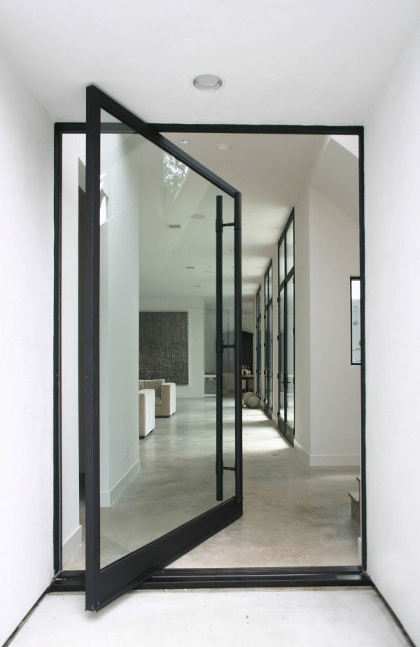 Glass pivot door as a front door