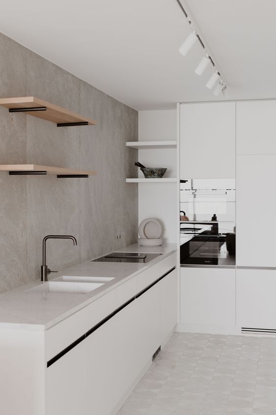 White minimalist kitchen with bare minimum fixtures
