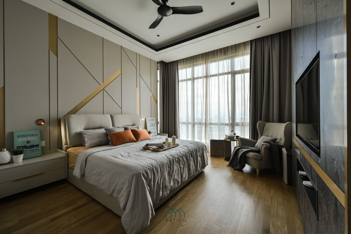 Modern contemporary master bedroom with gold-accented headboard