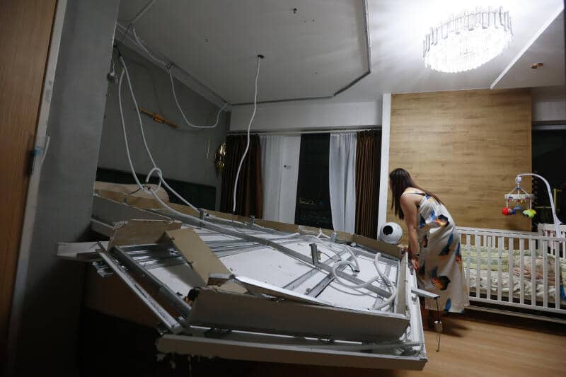 Above: Collapsed plaster ceiling on the bed