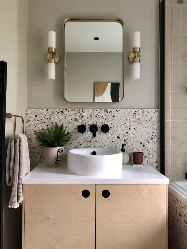 Above: Backsplash above the sink made from terrazzo tiles. Source: formandbalance