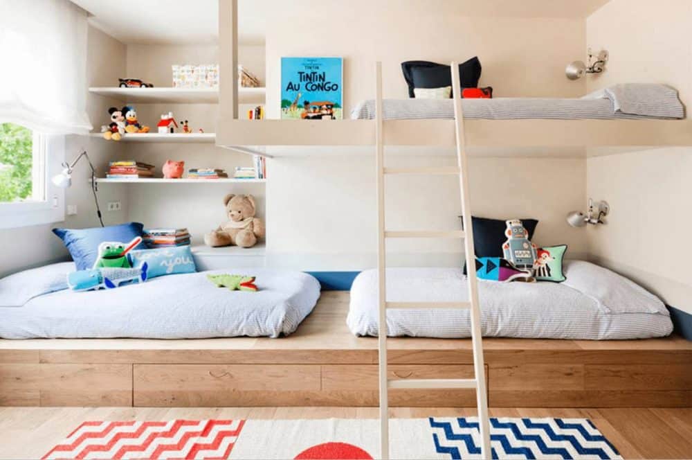 Bunk bed on raised platform with storage