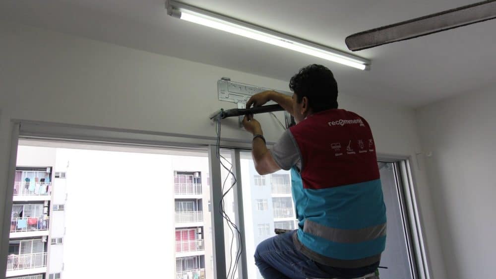 Above: Wall coring and mounting aircon back plate