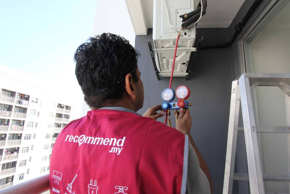 Above: Checking aircon refrigerant pressure